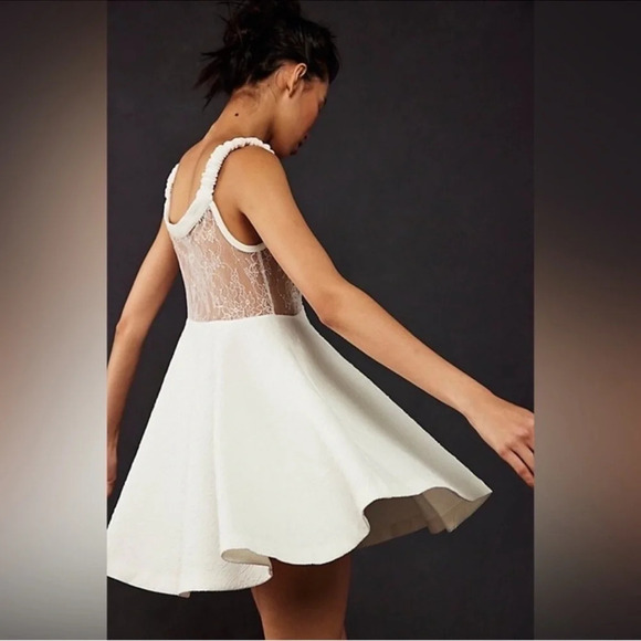 NWOT Free People ALLURING Brooklyn Mini Dress White L Lace Sheer Twirly Pockets - Picture 4 of 16